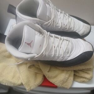 White and Black Sneakers with Red Logo